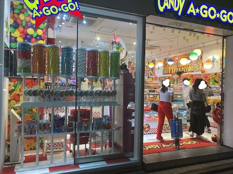In front of the candy shop